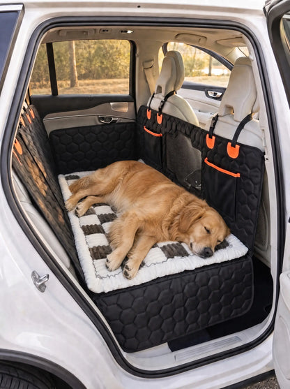 A golden retriever dog lies on the hard bottom silverhammock car seat cover with the silverhammock plush topper on top