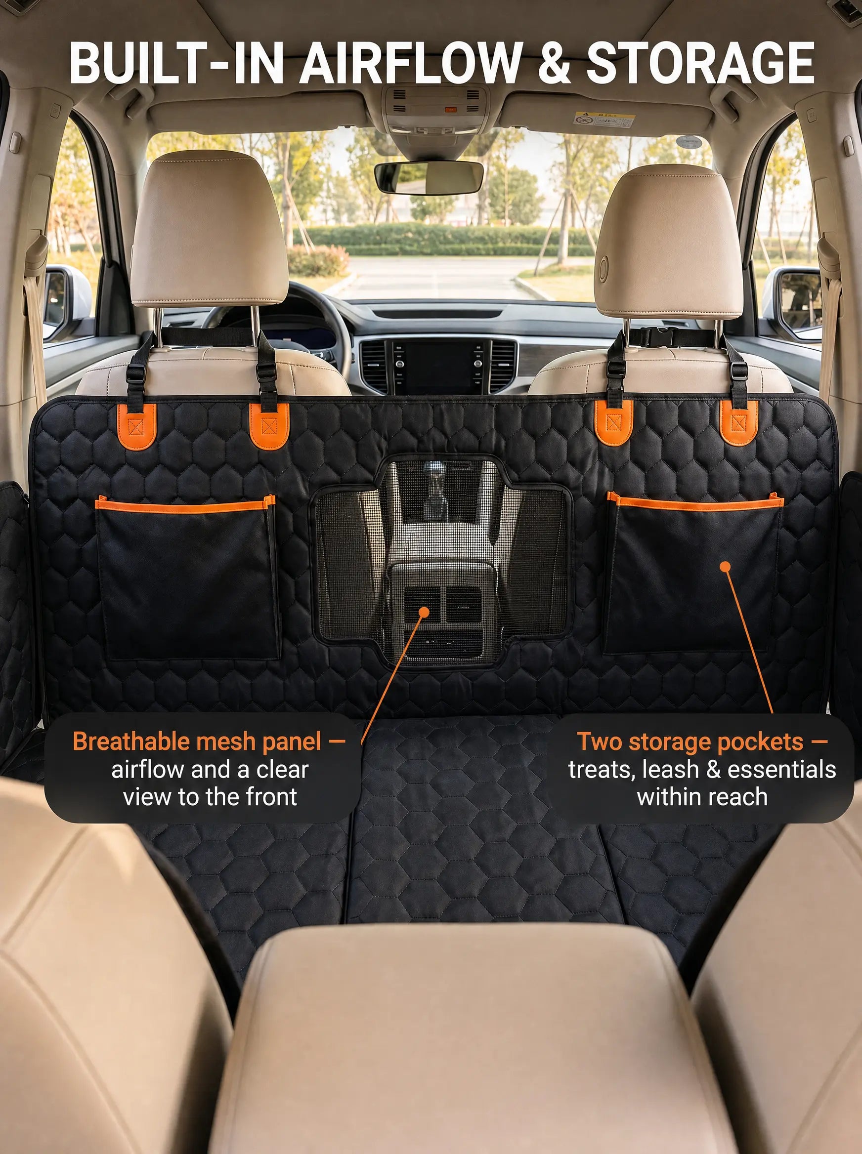SilverHammock dog seat cover back panel with breathable mesh window and two orange-trimmed storage pockets, seen from the rear seat of an SUV